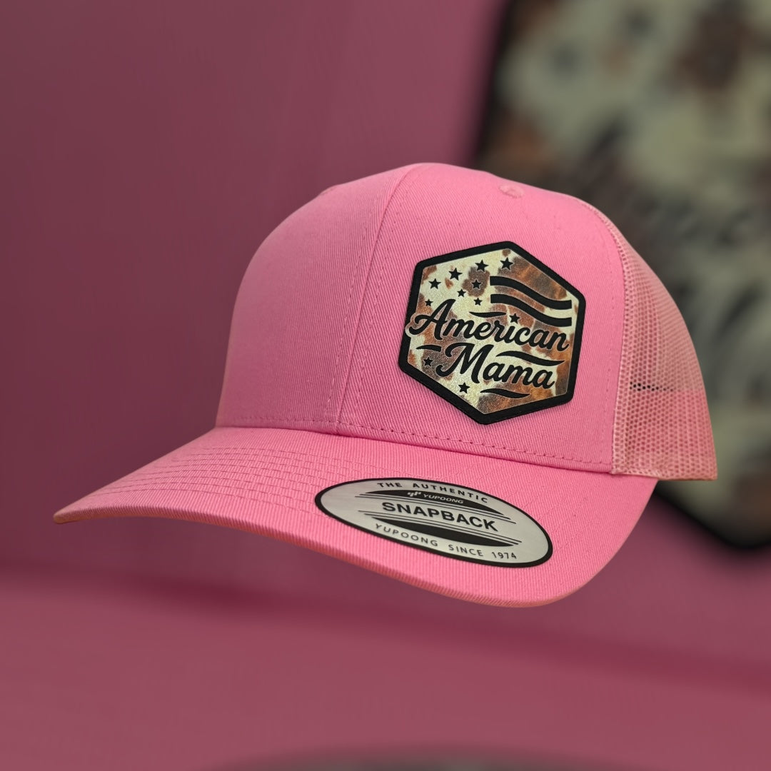 Pink cap with 'American Mama' patch on a pink background