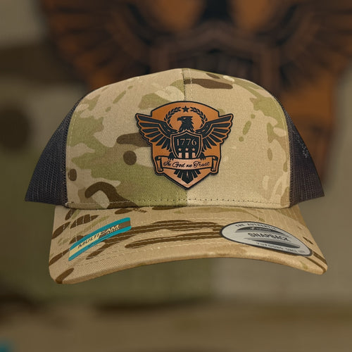 Camouflage baseball cap with an eagle emblem on a blurred background